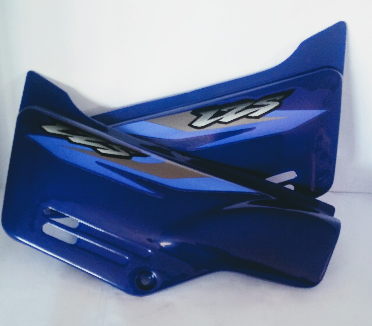 TAMPA LATERAL AZUL XLR 2002